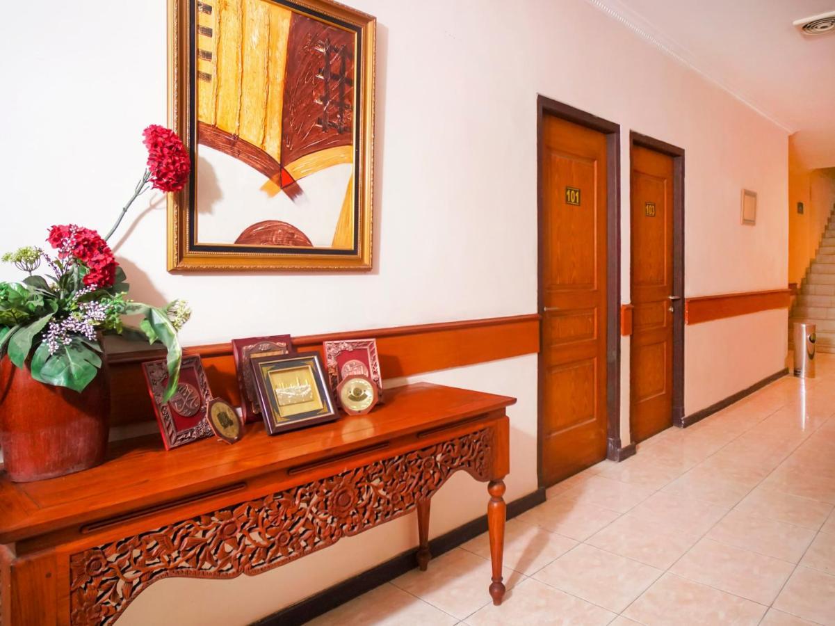 Capital O 142 Hotel Al Furqon Syariah Palembang Buitenkant foto